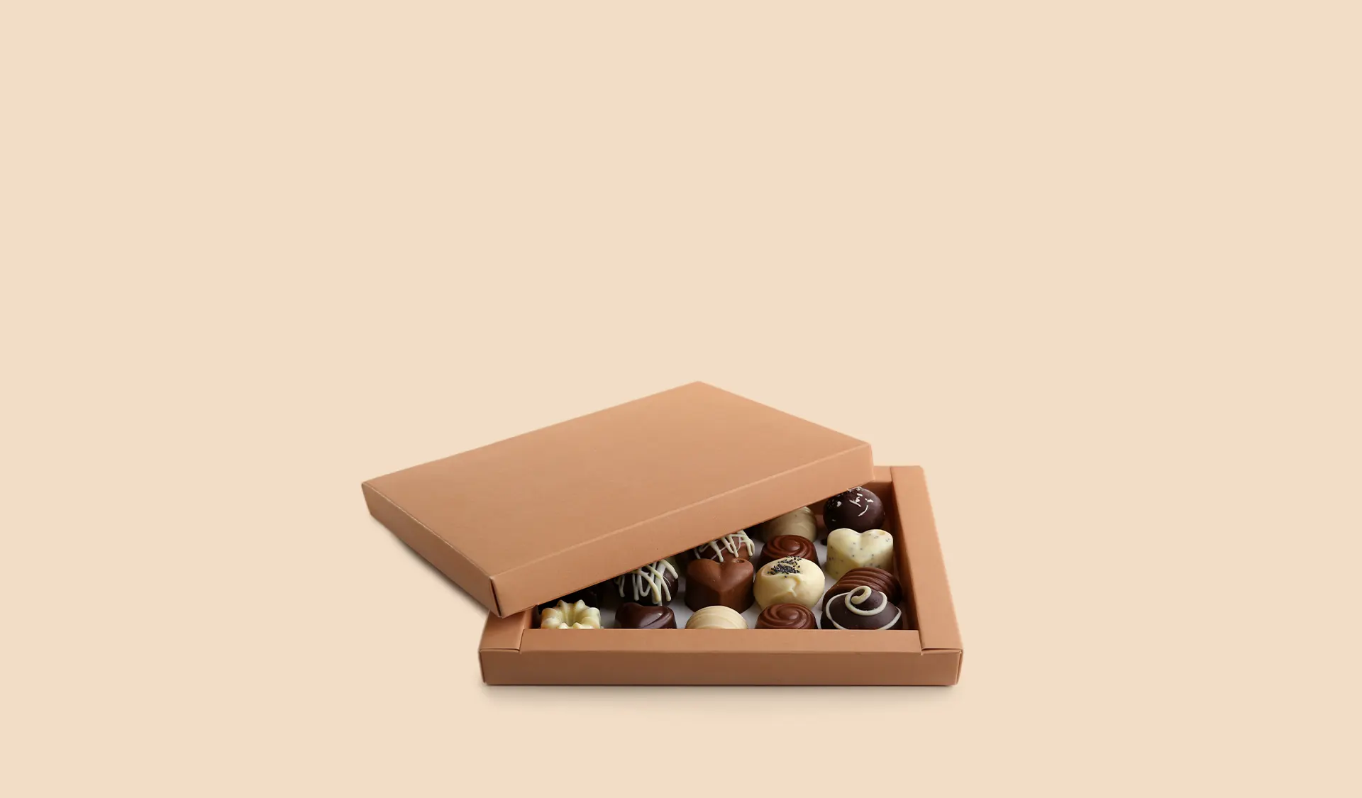 https://www.leplaisirduchocolat.com/wp-content/uploads/2022/01/chocolat-unique-slider-bg.webp